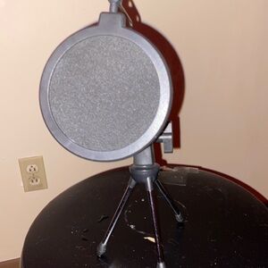 It’s a microphone stand.